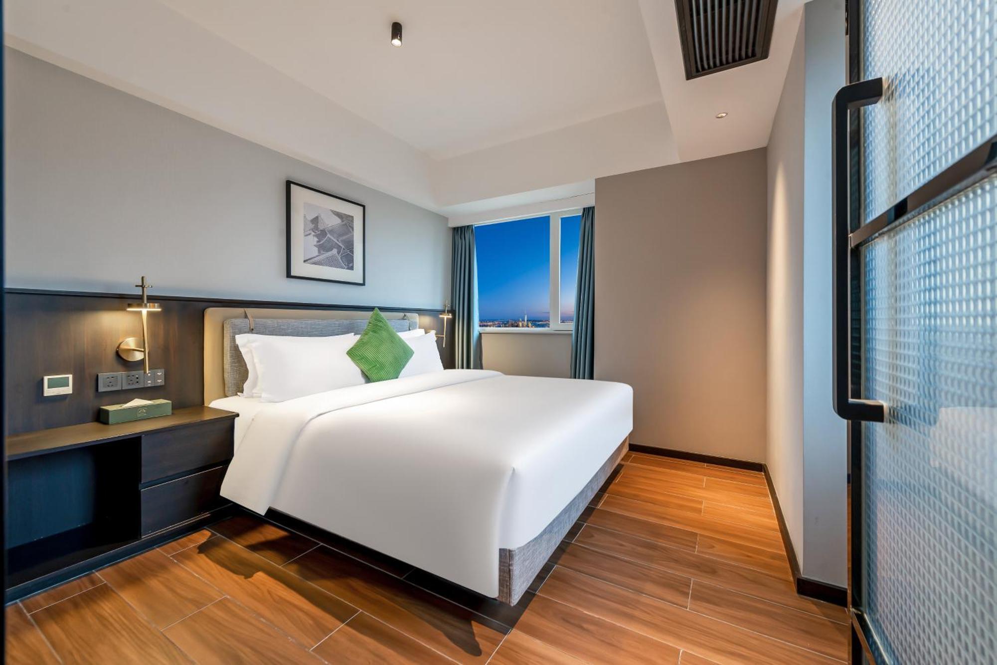 Xi'An Firefly Hotel Bagian luar foto